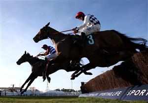 CHELTENHAM, ENGLAND - MARCH 16: Galvin ridden by Jack Kennedy jumps the last to win the Sam Vestey National Hunt Challenge Cup Novices' Chase (Grade 2) on Day One of the Cheltenham Festival at Cheltenham Racecourse on March 16, 2021 in Cheltenham, England. Sporting venues around the UK remain under strict restrictions due to the Coronavirus Pandemic as Government social distancing laws prohibit spectators inside venues resulting in events being held behind closed doors. (Photo by Michael Steele/Getty Images)