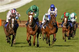 CHELTENHAM, ENGLAND - MARCH 16: Jack Kennedy riding Black Tears (L) clear the last to win The Close Brothers Mares' Hurdle at Cheltenham Racecourse on March 16, 2021 in Cheltenham, England. Sporting venues around the UK remain under strict restrictions due to the Coronavirus Pandemic as Government social distancing laws prohibit spectators inside venues resulting in events being held behind closed doors. (Photo by Alan Crowhurst/Getty Images)