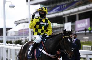 CHELTENHAM, ENGLAND - MARCH 16: Shishkin ridden by Nico de Boinville walks down in front of the main grandstand after winning the Sporting Life Arkle Challenge Trophy Novices' Chase (Grade 1) on Day One of the Cheltenham Festival at Cheltenham Racecourse on March 16, 2021 in Cheltenham, England. Sporting venues around the UK remain under strict restrictions due to the Coronavirus Pandemic as Government social distancing laws prohibit spectators inside venues resulting in events being held behind closed doors. (Photo by Michael Steele/Getty Images)
