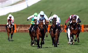 CHELTENHAM, ENGLAND - MARCH 16: Honeysuckle ridden by Rachael Blackmore heads up the home straight on the way to winning the Unibet Champion Hurdle Challenge Trophy (Grade 1) on Day One of the Cheltenham Festival at Cheltenham Racecourse on March 16, 2021 in Cheltenham, England. Sporting venues around the UK remain under strict restrictions due to the Coronavirus Pandemic as Government social distancing laws prohibit spectators inside venues resulting in events being held behind closed doors. (Photo by Michael Steele/Getty Images)