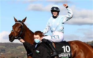 CHELTENHAM, ENGLAND - MARCH 16: Rachael Blackmore onboard Honeysuckle celebrates after victory in the Unibet Champion Hurdle Challenge Trophy (Grade 1) on Day One of the Cheltenham Festival at Cheltenham Racecourse on March 16, 2021 in Cheltenham, England. Sporting venues around the UK remain under strict restrictions due to the Coronavirus Pandemic as Government social distancing laws prohibit spectators inside venues resulting in events being held behind closed doors. (Photo by Michael Steele/Getty Images)