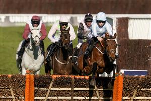 CHELTENHAM, ENGLAND - MARCH 16: Rachael Blackmore riding Honeysuckle clear the last to win The Unibet Champion Hurdle Challenge Trophy at Cheltenham Racecourse on March 16, 2021 in Cheltenham, England. Sporting venues around the UK remain under strict restrictions due to the Coronavirus Pandemic as Government social distancing laws prohibit spectators inside venues resulting in events being held behind closed doors. (Photo by Alan Crowhurst/Getty Images)