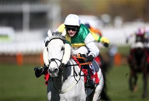 CHELTENHAM, ENGLAND - MARCH 16: Vintage Clouds ridden by Ryan Mania on their way to winning the Ultima Handicap Chase during day one of the Cheltenham Festival at Cheltenham Racecourse, on March 16, 2021 in Cheltenham, England. Sporting venues around the UK remain under strict restrictions due to the Coronavirus Pandemic as Government social distancing laws prohibit spectators inside venues resulting in events being held behind closed doors. (Photo by Tim Goode - Pool/Getty Images)