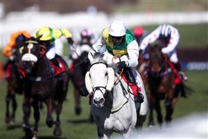 CHELTENHAM, ENGLAND - MARCH 16: Vintage Clouds ridden by Ryan Mania on their way to winning the Ultima Handicap Chase during day one of the Cheltenham Festival at Cheltenham Racecourse, on March 16, 2021 in Cheltenham, England. Sporting venues around the UK remain under strict restrictions due to the Coronavirus Pandemic as Government social distancing laws prohibit spectators inside venues resulting in events being held behind closed doors. (Photo by Tim Goode - Pool/Getty Images)