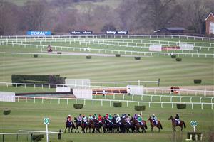 CHELTENHAM, ENGLAND - MARCH 17: The field gathers for the start of the Coral Cup Handicap Hurdle (Grade 3) race on Day Two of the Cheltenham Festival 2021 at Cheltenham Racecourse on March 17, 2021 in Cheltenham, England. Sporting venues around the UK remain under strict restrictions due to the Coronavirus Pandemic as Government social distancing laws prohibit spectators inside venues resulting in events being held behind closed doors. (Photo by Michael Steele/Getty Images)