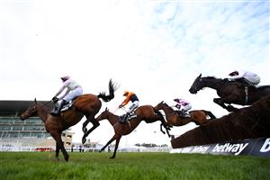 CHELTENHAM, ENGLAND - MARCH 17: Chacun Pour Soi ridden by Paul Townend (Pink and Green/L) and Put The Kettle On ridden by Aidan Coleman (Orange and Black/C) jump the last fence during the Betway Queen Mother Champion Chase (Grade 1) race on Day Two of the Cheltenham Festival 2021 at Cheltenham Racecourse on March 17, 2021 in Cheltenham, England. Sporting venues around the UK remain under strict restrictions due to the Coronavirus Pandemic as Government social distancing laws prohibit spectators inside venues resulting in events being held behind closed doors. (Photo by Michael Steele/Getty Images)