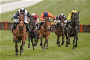 CHELTENHAM, ENGLAND - MARCH 17: Rachael Blackmore riding Bob Olinger (black sleeves) clear the last to win The Ballymore Novices' Hurdle at Cheltenham Racecourse on March 17, 2021 in Cheltenham, England. Sporting venues around the UK remain under strict restrictions due to the Coronavirus Pandemic as Government social distancing laws prohibit spectators inside venues resulting in events being held behind closed doors. (Photo by Alan Crowhurst/Getty Images)