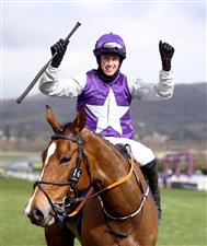 CHELTENHAM, ENGLAND - MARCH 18: Mrs Milner ridden by Bryan Cooper poses after winning the Pertemps Network Final Handicap Hurdle on day three of the Cheltenham Festival at Cheltenham Racecourse on March 18, 2021 in Cheltenham, England. Sporting venues around the UK remain under strict restrictions due to the Coronavirus Pandemic as Government social distancing laws prohibit spectators inside venues resulting in events being held behind closed doors. (Photo by Tim Goode-Pool/Getty Images)