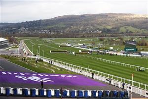 CHELTENHAM, ENGLAND - MARCH 18: A general view in front of the empty main grandstand as the field makes their way around in the Paddy Power Plate Handicap Chase (Grade 3) during Day Three of the Cheltenham Festival 2021 at Cheltenham Racecourse on March 18, 2021 in Cheltenham, England. Sporting venues around the UK remain under strict restrictions due to the Coronavirus Pandemic as Government social distancing laws prohibit spectators inside venues resulting in events being held behind closed doors. (Photo by Michael Steele/Getty Images)