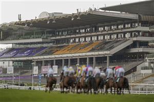 CHELTENHAM, ENGLAND - MARCH 18: A general view as runners make their way up the straight during The Parnell Properties Mares' Novices' Hurdle at Cheltenham Racecourse on March 18, 2021 in Cheltenham, England. Sporting venues around the UK remain under strict restrictions due to the Coronavirus Pandemic as Government social distancing laws prohibit spectators inside venues resulting in events being held behind closed doors. (Photo by Alan Crowhurst/Getty Images)