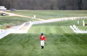 CHELTENHAM, ENGLAND - MARCH 18: Jack Kennedy walks back along the course after falling from Envoi Allen during the Marsh Novices' Chase on day three of the Cheltenham Festival at Cheltenham Racecourse on March 18, 2021 in Cheltenham, England. Sporting venues around the UK remain under strict restrictions due to the Coronavirus Pandemic as Government social distancing laws prohibit spectators inside venues resulting in events being held behind closed doors. (Photo by Tim Goode-Pool/Getty Images)