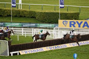 CHELTENHAM, ENGLAND - MARCH 18: Jack Kennedy riding Mount Ida (R) clear the last to win The Fulke Walwyn Kim Muir Challenge Cup Handicap Chase at Cheltenham Racecourse on March 18, 2021 in Cheltenham, England. Sporting venues around the UK remain under strict restrictions due to the Coronavirus Pandemic as Government social distancing laws prohibit spectators inside venues resulting in events being held behind closed doors. (Photo by Alan Crowhurst/Getty Images)