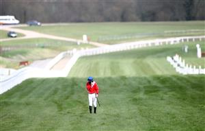 CHELTENHAM, ENGLAND - MARCH 18: Jack Kennedy walks back along the course after falling from Envoi Allen during the Marsh Novices' Chase on day three of the Cheltenham Festival at Cheltenham Racecourse on March 18, 2021 in Cheltenham, England. Sporting venues around the UK remain under strict restrictions due to the Coronavirus Pandemic as Government social distancing laws prohibit spectators inside venues resulting in events being held behind closed doors. (Photo by Tim Goode-Pool/Getty Images)