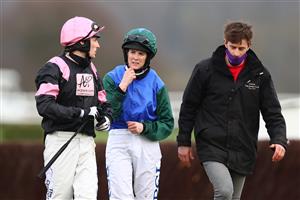CHELTENHAM, ENGLAND - MARCH 18: Rachael Blackmore speaks with Harry Bannister after they fell off Plan Of Attack and Bob Mahler respectively in the Fulke Walwyn Kim Muir Challenge Cup Handicap Chase during Day Three of the Cheltenham Festival 2021 at Cheltenham Racecourse on March 18, 2021 in Cheltenham, England. Sporting venues around the UK remain under strict restrictions due to the Coronavirus Pandemic as Government social distancing laws prohibit spectators inside venues resulting in events being held behind closed doors. (Photo by Michael Steele/Getty Images)