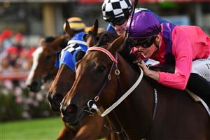 MELBOURNE, AUSTRALIA - MARCH 19: Teodore Nugent riding Green Ivy winning Race 3, the Ascend Sales Trophies Handicap, during Melbourne Racing at Moonee Valley Racecourse on March 19, 2021 in Melbourne, Australia. (Photo by Vince Caligiuri/Getty Images)
