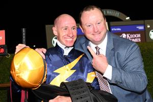 MELBOURNE, AUSTRALIA - MARCH 19: William Pike poses with trainer Wayne Hawkes after riding Masked Crusader to win Race 7, the Keogh Homes William Reid Stakes, during Melbourne Racing at Moonee Valley Racecourse on March 19, 2021 in Melbourne, Australia. (Photo by Vince Caligiuri/Getty Images)