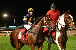 MELBOURNE, AUSTRALIA - MARCH 19: William Pike riding Masked Crusader after winning Race 7, the Keogh Homes William Reid Stakes, during Melbourne Racing at Moonee Valley Racecourse on March 19, 2021 in Melbourne, Australia. (Photo by Vince Caligiuri/Getty Images)