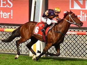 MELBOURNE, AUSTRALIA - MARCH 19: William Pike riding Masked Crusader winning Race 7, the Keogh Homes William Reid Stakes, during Melbourne Racing at Moonee Valley Racecourse on March 19, 2021 in Melbourne, Australia. (Photo by Vince Caligiuri/Getty Images)