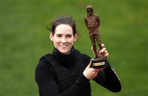 CHELTENHAM, ENGLAND - MARCH 19: Rachel Blackmore poses with The Ruby Walsh Trophy during day four of the Cheltenham Festival at Cheltenham Racecourse on March 19, 2021 in Cheltenham, England. Sporting venues around the UK remain under strict restrictions due to the Coronavirus Pandemic as Government social distancing laws prohibit spectators inside venues resulting in events being held behind closed doors. (Photo by Tim Goode - Pool/Getty Images)