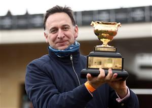 CHELTENHAM, ENGLAND - MARCH 19: Trainer Henry de Bromhead with the Gold Cup after winning the WellChild Cheltenham Gold Cup Chase with Minella Indo on day four of the Cheltenham Festival at Cheltenham Racecourse, on March 19, 2021 in Cheltenham, England. Sporting venues around the UK remain under strict restrictions due to the Coronavirus Pandemic as Government social distancing laws prohibit spectators inside venues resulting in events being held behind closed doors. (Photo by Tim Goode - Pool/Getty Images)