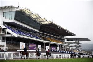 CHELTENHAM, ENGLAND - MARCH 19: Horses return from the gallops on day four of the Cheltenham Festival at Cheltenham Racecourse on March 19, 2021 in Cheltenham, England. Sporting venues around the UK remain under strict restrictions due to the Coronavirus Pandemic as Government social distancing laws prohibit spectators inside venues resulting in events being held behind closed doors. (Photo by Tim Goode - Pool/Getty Images)