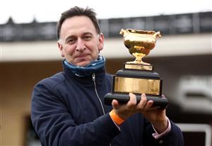 CHELTENHAM, ENGLAND - MARCH 19: Trainer Henry de Bromhead with the Gold Cup after winning the WellChild Cheltenham Gold Cup Chase with Minella Indo on day four of the Cheltenham Festival at Cheltenham Racecourse, on March 19, 2021 in Cheltenham, England. Sporting venues around the UK remain under strict restrictions due to the Coronavirus Pandemic as Government social distancing laws prohibit spectators inside venues resulting in events being held behind closed doors. (Photo by Tim Goode - Pool/Getty Images)