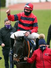 CHELTENHAM, ENGLAND - MARCH 19: Porlock Bay ridden by Lorcan Williams after winning the St. James's Place Festival Challenge Cup Open Hunters' Chase on day four of the Cheltenham Festival at Cheltenham Racecourse on March 19, 2021 in Cheltenham, England. Sporting venues around the UK remain under strict restrictions due to the Coronavirus Pandemic as Government social distancing laws prohibit spectators inside venues resulting in events being held behind closed doors. (Photo by Tim Goode - Pool/Getty Images)