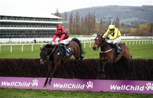 CHELTENHAM, ENGLAND - MARCH 19: Porlock Bay (left) ridden by Lorcan Williams on their way to winning the St. James's Place Festival Challenge Cup Open Hunters' Chase on day four of the Cheltenham Festival at Cheltenham Racecourse, on March 19, 2021 in Cheltenham, England. Sporting venues around the UK remain under strict restrictions due to the Coronavirus Pandemic as Government social distancing laws prohibit spectators inside venues resulting in events being held behind closed doors. (Photo by Tim Goode - Pool/Getty Images)