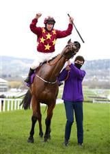 CHELTENHAM, ENGLAND - MARCH 19: Jack Kennedy (jockey of Minella Indo) celebrates winning the Gold Cup during the WellChild Cheltenham Gold Cup Chase (Grade 1) race on Day Four of the Cheltenham Festival 2021 at Cheltenham Racecourse on March 19, 2021 in Cheltenham, England. Sporting venues around the UK remain under strict restrictions due to the Coronavirus Pandemic as Government social distancing laws prohibit spectators inside venues resulting in events being held behind closed doors. (Photo by Michael Steele/Getty Images)