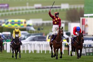 CHELTENHAM, ENGLAND - MARCH 19: Jack Kennedy (Jockey of Minella Indo) celebrates crossing the line during the WellChild Cheltenham Gold Cup Chase (Grade 1) race on Day Four of the Cheltenham Festival 2021 at Cheltenham Racecourse on March 19, 2021 in Cheltenham, England. Sporting venues around the UK remain under strict restrictions due to the Coronavirus Pandemic as Government social distancing laws prohibit spectators inside venues resulting in events being held behind closed doors. (Photo by Michael Steele/Getty Images)