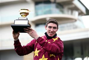 CHELTENHAM, ENGLAND - MARCH 19: Minella Indo ridden by Jack Kennedy celebrates after winning the WellChild Cheltenham Gold Cup Chase on day four of the Cheltenham Festival at Cheltenham Racecourse on March 19, 2021 in Cheltenham, England. Sporting venues around the UK remain under strict restrictions due to the Coronavirus Pandemic as Government social distancing laws prohibit spectators inside venues resulting in events being held behind closed doors. (Photo by Tim Goode - Pool/Getty Images)