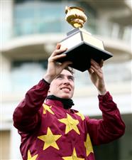 CHELTENHAM, ENGLAND - MARCH 19: Minella Indo ridden by Jack Kennedy celebrates after winning the WellChild Cheltenham Gold Cup Chase on day four of the Cheltenham Festival at Cheltenham Racecourse on March 19, 2021 in Cheltenham, England. Sporting venues around the UK remain under strict restrictions due to the Coronavirus Pandemic as Government social distancing laws prohibit spectators inside venues resulting in events being held behind closed doors. (Photo by Tim Goode - Pool/Getty Images)