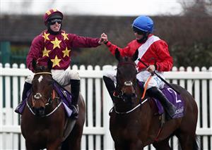 CHELTENHAM, ENGLAND - MARCH 19: Minella Indo ridden by Jack Kennedy (left) alongside Rachel Blackmore aboard A Plus Tard after winning the WellChild Cheltenham Gold Cup Chase on day four of the Cheltenham Festival at Cheltenham Racecourse on March 19, 2021 in Cheltenham, England. Sporting venues around the UK remain under strict restrictions due to the Coronavirus Pandemic as Government social distancing laws prohibit spectators inside venues resulting in events being held behind closed doors. (Photo by Tim Goode - Pool/Getty Images)