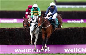 CHELTENHAM, ENGLAND - MARCH 19: Colreevy ridden by Paul Townend (R) competes against Elimay ridden by Mark Walsh (L) during the Mrs Paddy Power Mares' Chase (Registered As The Liberthine Mares' Chase) (Grade 2) race on Day Four of the Cheltenham Festival 2021 at Cheltenham Racecourse on March 19, 2021 in Cheltenham, England. Sporting venues around the UK remain under strict restrictions due to the Coronavirus Pandemic as Government social distancing laws prohibit spectators inside venues resulting in events being held behind closed doors. (Photo by Michael Steele/Getty Images)