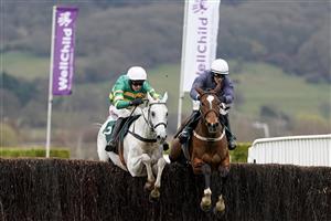 CHELTENHAM, ENGLAND - MARCH 19: Paul Townend riding Colreevy (R) clear the last to win The Mrs Paddy Power Mares' Chase from Mark Walsh and Elimay (L) at Cheltenham Racecourse on March 19, 2021 in Cheltenham, England. Sporting venues around the UK remain under strict restrictions due to the Coronavirus Pandemic as Government social distancing laws prohibit spectators inside venues resulting in events being held behind closed doors. (Photo by Alan Crowhurst/Getty Images)