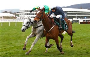 CHELTENHAM, ENGLAND - MARCH 19: Colreevy ridden by Paul Townend (R) competes against Elimay ridden by Mark Walsh (L) during the Mrs Paddy Power Mares' Chase (Registered As The Liberthine Mares' Chase) (Grade 2) race on Day Four of the Cheltenham Festival 2021 at Cheltenham Racecourse on March 19, 2021 in Cheltenham, England. Sporting venues around the UK remain under strict restrictions due to the Coronavirus Pandemic as Government social distancing laws prohibit spectators inside venues resulting in events being held behind closed doors. (Photo by Michael Steele/Getty Images)