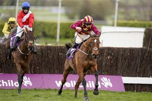 CHELTENHAM, ENGLAND - MARCH 19: Jack Kennedy riding Minella Indo (R) clear the last to win The WellChild Cheltenham Gold Cup Chase from Rachael Blackmore and A Plus Tard (red) at Cheltenham Racecourse on March 19, 2021 in Cheltenham, England. Sporting venues around the UK remain under strict restrictions due to the Coronavirus Pandemic as Government social distancing laws prohibit spectators inside venues resulting in events being held behind closed doors. (Photo by Alan Crowhurst/Getty Images)