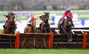 CHELTENHAM, ENGLAND - MARCH 19: Quilixios ridden by Rachael Blackmore jumps the last fence while on the way to victory during the JCB Triumph Hurdle (Grade 1) race on Day Four of the Cheltenham Festival 2021 at Cheltenham Racecourse on March 19, 2021 in Cheltenham, England. Sporting venues around the UK remain under strict restrictions due to the Coronavirus Pandemic as Government social distancing laws prohibit spectators inside venues resulting in events being held behind closed doors. (Photo by Michael Steele/Getty Images)