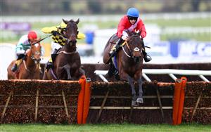 CHELTENHAM, ENGLAND - MARCH 19: Quilixios ridden by Rachael Blackmore jumps the last fence while on the way to victory during the JCB Triumph Hurdle (Grade 1) race on Day Four of the Cheltenham Festival 2021 at Cheltenham Racecourse on March 19, 2021 in Cheltenham, England. Sporting venues around the UK remain under strict restrictions due to the Coronavirus Pandemic as Government social distancing laws prohibit spectators inside venues resulting in events being held behind closed doors. (Photo by Michael Steele/Getty Images)