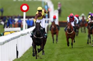 CHELTENHAM, ENGLAND - MARCH 19: Galopin Des Champs ridden by Sean O'Keeffe crosses the line to win the Martin Pipe Conditional Jockeys' Handicap Hurdle (GBB Race) (Class 2) race on Day Four of the Cheltenham Festival 2021 at Cheltenham Racecourse on March 19, 2021 in Cheltenham, England. Sporting venues around the UK remain under strict restrictions due to the Coronavirus Pandemic as Government social distancing laws prohibit spectators inside venues resulting in events being held behind closed doors. (Photo by Michael Steele/Getty Images)