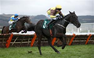 CHELTENHAM, ENGLAND - MARCH 19: Galopin Des Champs ridden by Sean O'Keeffe jumps the last to win The Martin Pipe Conditional Jockeys' Handicap Hurdle during day four of the Cheltenham Festival at Cheltenham Racecourse on March 19, 2021 in Cheltenham, England. Sporting venues around the UK remain under strict restrictions due to the Coronavirus Pandemic as Government social distancing laws prohibit spectators inside venues resulting in events being held behind closed doors. (Photo by Tim Goode - Pool/Getty Images)