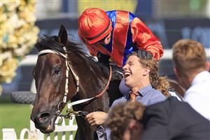 SYDNEY, AUSTRALIA - MARCH 27: Glen Boss on Think It Over (orange/blue) returns to scale after winning race 6 the Agency George Ryder Stakes during Golden Slipper Day at Rosehill Gardens on March 27, 2021 in Sydney, Australia. (Photo by Mark Evans/Getty Images)