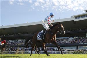 SYDNEY, AUSTRALIA - MARCH 27: Tommy Berry wins the Golden Slipper on Stay Inside uring Golden Slipper Day at Rosehill Gardens on March 27, 2021 in Sydney, Australia. (Photo by Mark Evans/Getty Images)
