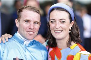 SYDNEY, AUSTRALIA - MARCH 27: Tommy Berry hugs trainer Annabel Neasham who won her first Group 1 race with Mo'unga in the Rosehill Guineas. (Getty)