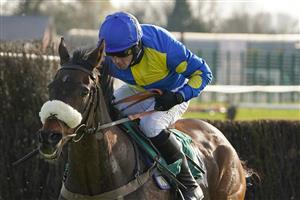 WARWICK, ENGLAND - MARCH 30: William Biddick riding Caid du Berlais clear the last to win The Air Wedding Open Hunters' Chase at Warwick Racecourse on March 30, 2021 in Warwick, England. Sporting venues around the UK remain under restrictions due to the Coronavirus Pandemic. Only owners are allowed to attend the meeting but the public must wait until further restrictions are lifted. (Photo by Alan Crowhurst/Getty Images)