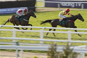 WARWICK, ENGLAND - MARCH 30: Brendan Powell riding Black Poppy win The racingtv.com Maiden Open NH Flat Race (GBB Race) (Div 1) at Warwick Racecourse on March 30, 2021 in Warwick, England. Sporting venues around the UK remain under restrictions due to the Coronavirus Pandemic. Only owners are allowed to attend the meeting but the public must wait until further restrictions are lifted. (Photo by Alan Crowhurst/Getty Images)