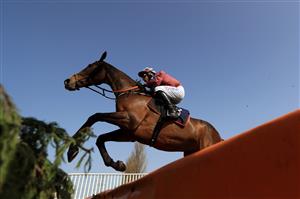 SOUTHWELL, ENGLAND - MARCH 31: First Class Return ridden by Harry Skelton on their way to winning the Free Tips Daily On attheraces.com Handicap Chase at Southwell Racecourse on March 31, 2021 in Southwell, England. (Photo by Mike Egerton-Pool/Getty Images)