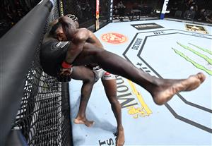 LAS VEGAS, NEVADA - MARCH 27: In this handout image provided by UFC, (R-L) Alonzo Menifield takes down Fabio Cherant in their light heavyweight fight during the UFC 260 event at UFC APEX on March 27, 2021 in Las Vegas, Nevada. (Photo by Jeff Bottari/Zuffa LLC via Getty Images)