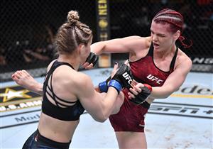LAS VEGAS, NEVADA - MARCH 27: In this handout image provided by UFC, (R-L) Gillian Robertson of Canada kicks Miranda Maverick in their lightweight fight during the UFC 260 event at UFC APEX on March 27, 2021 in Las Vegas, Nevada. (Photo by Jeff Bottari/Zuffa LLC via Getty Images)