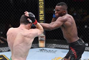 LAS VEGAS, NEVADA - MARCH 27: In this handout image provided by UFC, (R-L) Khama Worthy punches Jamie Mullarkey of Australia in their lightweight fight during the UFC 260 event at UFC APEX on March 27, 2021 in Las Vegas, Nevada. (Photo by Jeff Bottari/Zuffa LLC via Getty Images)